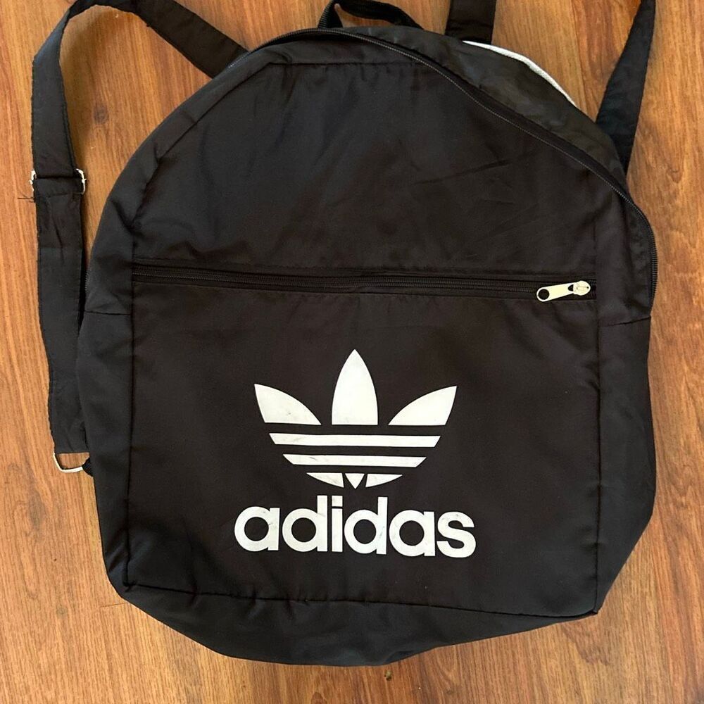 Adidas Black lightweight nylon knapsack backpack gym bag.